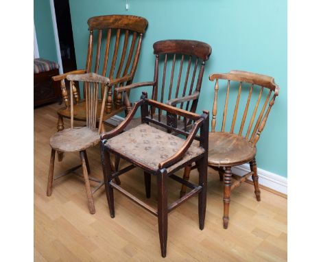 Five antique wooden chairs, to include a Farmhouse armchair with an elm seat, a Windsor armchair, two Victorian stick back ch