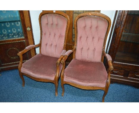 A PAIR OF MAHOGANY BUTTON BACK ARMCHAIRS