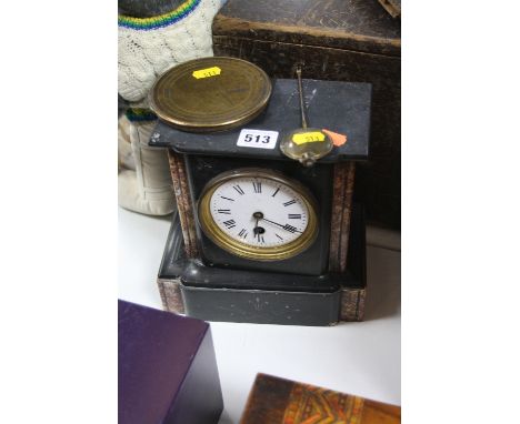 A SLATE MANTEL CLOCK, glass missing and back loose, pendulum only
