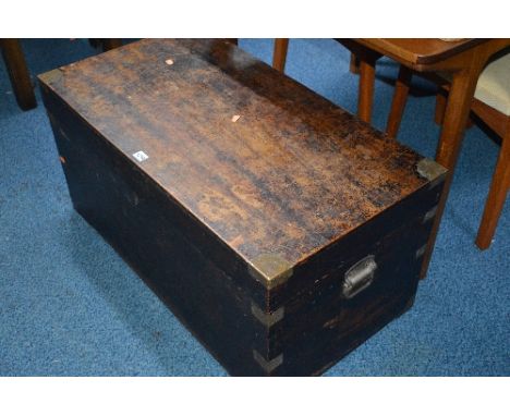 A STAINED HARDWOOD TRUNK, with metal banding