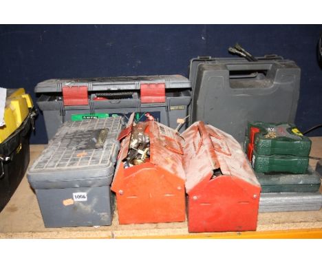 TWO PLASTIC AND TWO METAL TOOL BOXES, containing various hand tools and a boxed Draper mitre saw and four boxed drill/socket 