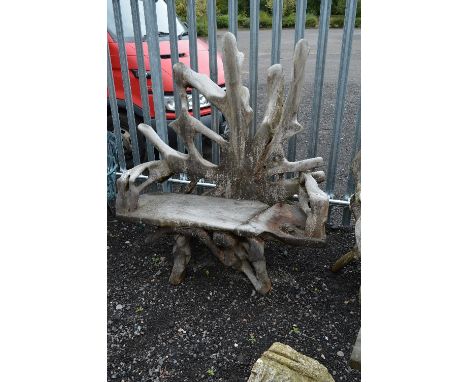 A TEAK ROOT TWO SEATER GARDEN BENCH, approximate size width 129cm x height 143cm