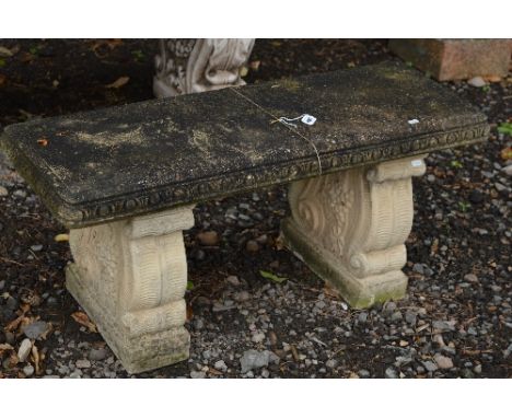 A PRE-CAST GARDEN BENCH ON SEPERATE LEGS, approximate length 98cm
