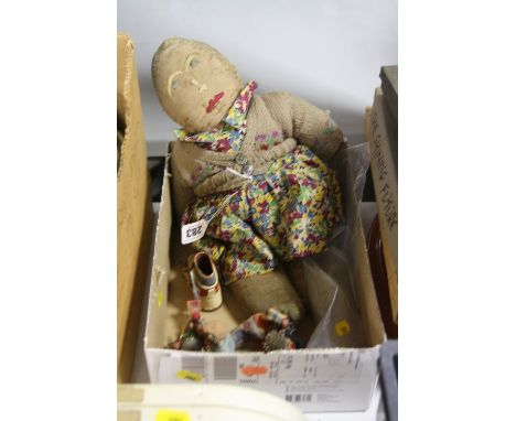 AN EARLY MERRYTHOUGHT CLOTH DOLL, embroidered features, distressed condition, missing most of original pink plush, some damag