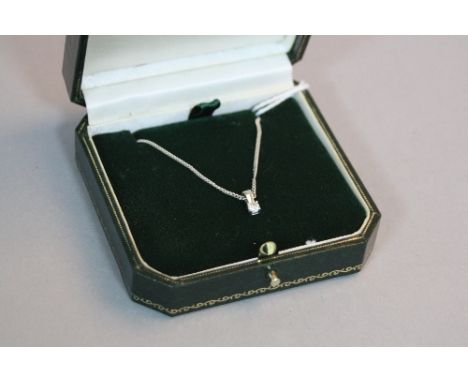 A 18CT WHITE GOLD MODERN DIAMOND SINGLE STONE PENDANT, estimated total modern round brilliant cut weight 0.12ct, colour asses