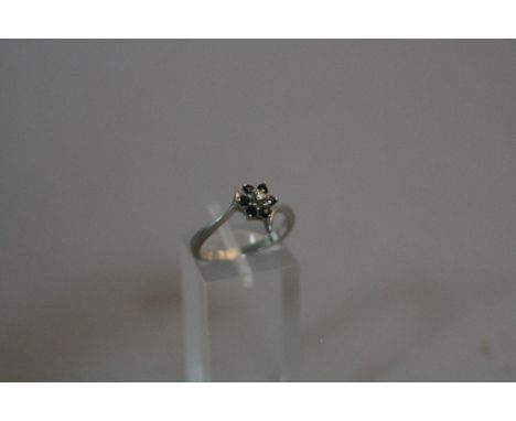 A 14CT WHITE GOLD SAPPHIRE AND DIAMOND RING, ring size M, approximate weight 2.6 grams