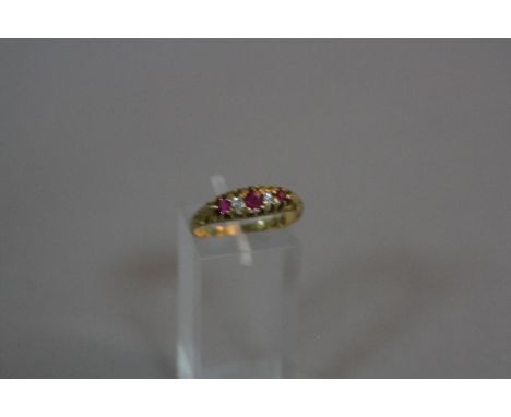 A VICTORIAN RUBY AND DIAMOND GYPSY RING, Birmingham 1898, ring size Q, approximate weight 3.0 grams