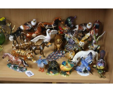 TWENTY FOUR JEWELLED METAL/ENAMEL ANIMAL BOXES, to include horses, peacock, tiger, eagles, other birds etc