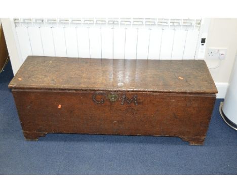 AN 18TH CENTURY OAK BLANKET CHEST, with inner candle box and drawer, bearing initials G M to front, approximate size width 11