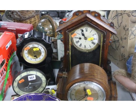 A SMITHS ELECTRIC BAKELITE CLOCK, a ceramic mantel clock (no key or pendulum), two other clocks (one with key and pendulum) (