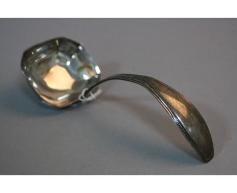 A SILVER LADLE, and a silver crown (2)