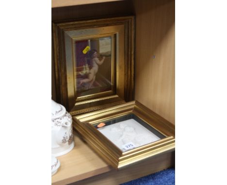A FRAMED CERAMIC PLAQUE, depicting seated nude couple with man touching female foot, size approximately 16cm x 14cm, together