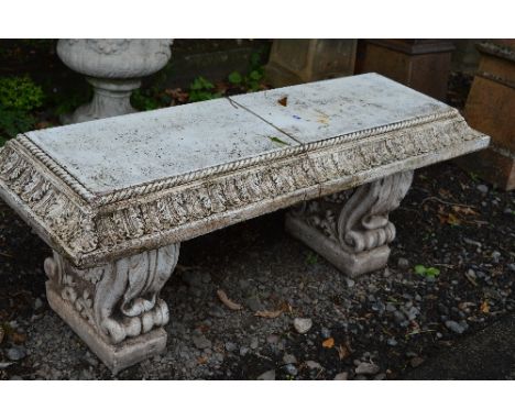 A PAINTED PRE-CAST GARDEN BENCH ON SEPERATE LEGS, approximate length 132cm (sd)
