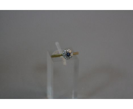 AN 18CT SAPPHIRE AND DIAMOND CLUSTER RING, ring size M, approximate weight 2.4 grams