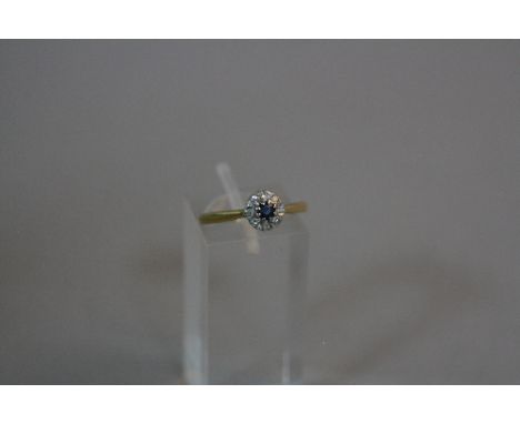 AN 18CT SAPPHIRE AND DIAMOND CLUSTER RING, ring size M, approximate weight 2.4 grams