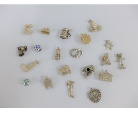 Twenty various silver charms (20) 