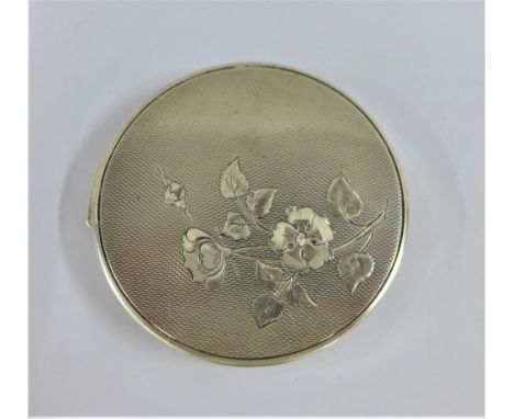 Silver compact with rose pattern to the hinged lid, Birmingham 1962 