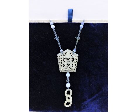 Carved jade pendant plaque on a string necklace with blue hardstone beads, plaque is 5 x 5cm 