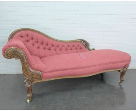 A Victorian mahogany framed button back chaise longue, with brass caps and ceramic castors, 190 x 88 x 70cm