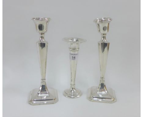 George V pair of silver candlesticks, Chester 1915 (weighted - one a/f)  together with an Edwardian  silver vase, Birmingham 
