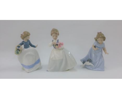 Three Nao porcelain girl figures, tallest 18cm 
