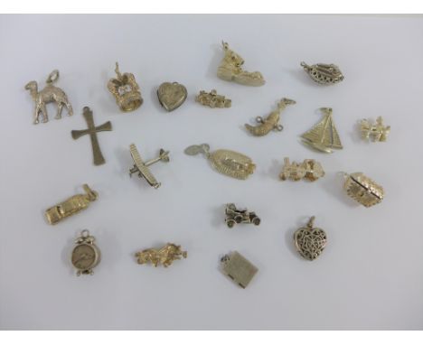 Twenty various silver charms (20) 