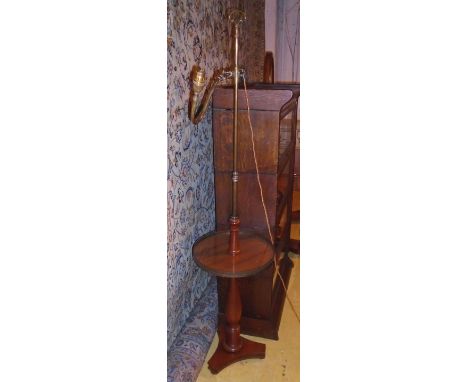 STANDING LAMP, mahogany and brass, adjustable, with a circular tray on turned column and triform base, 40cm W x 167cm H.