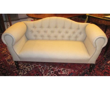 SOFA, in cream upholstery with button back on turned supports, 140cm W.