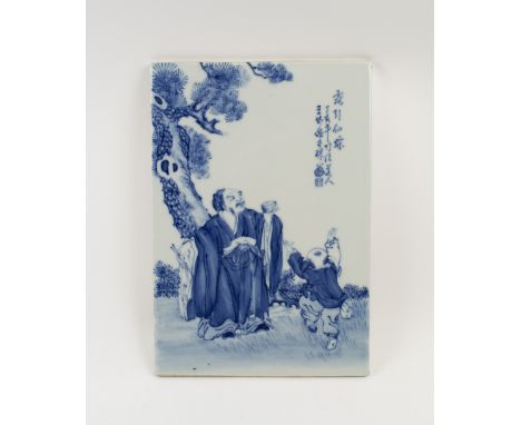 CHINESE BLUE/WHITE TILE, early 20th century, by the artist Wang Bu (1898-1968), depicting a child with an elder, signed, 36.5