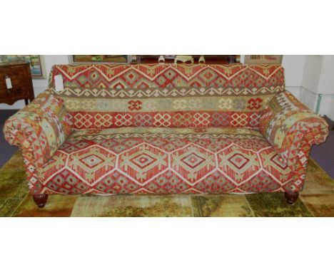 GEORGE SMITH STYLE SOFA, Anatolian kilim carpet upholstered with ribbed feet, 217cm W.