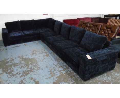 CORNER SOFA, in navy blue upholstery on block supports, 404cm x 255cm. 