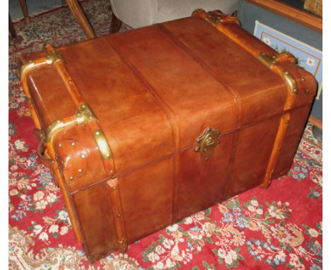 TRUNK, tan leather Ralph Lauren style with metal clad wooden bindings, 75cm W x 47cm H.