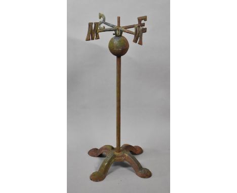 A Cast Iron Weather Vane Stand, Compass Points Mounted Upside Down, 69cms High 