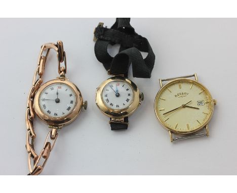 A lady's 9ct gold bracelet watch, another on fabric strap, and a 9ct gold Rotary wristwatch (a/f)