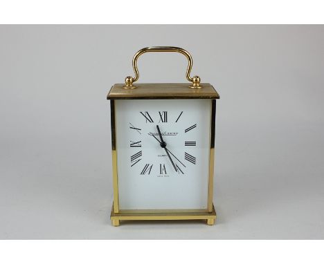 A Jaeger-LeCoultre brass cased quartz mantel clock