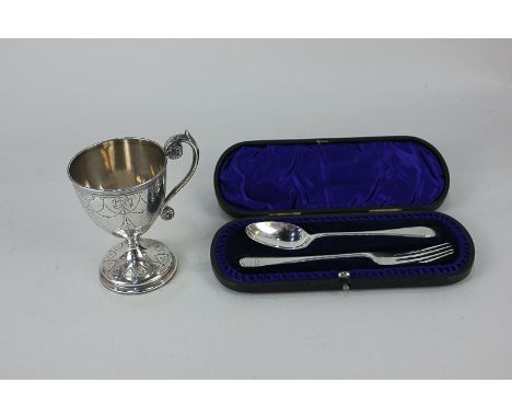 A Victorian silver christening cup, makers Edward &amp; John Barnard, London 1859, presented, together with a silver cased ch