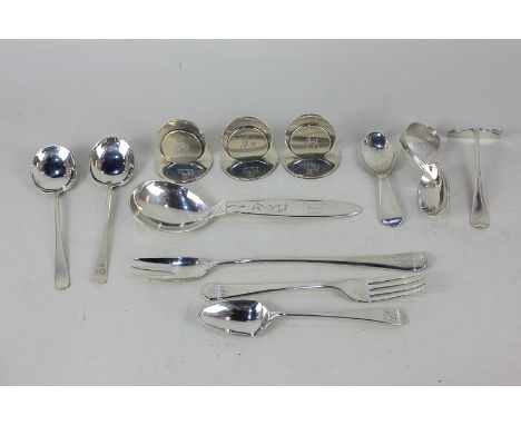 Three Edward VII silver menu holders, Chester 1907, together with a selection of silver spoons including a caddy spoon, pickl