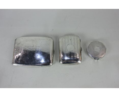 A George V silver cigarette case, maker Henry Matthews, Birmingham 1924, together with another silver cigarette case, present