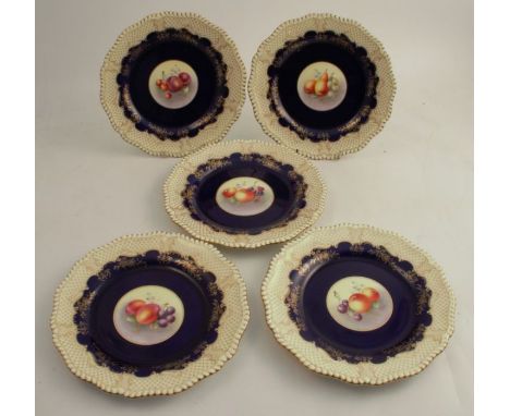 Five Royal Worcester plates, painted to the centre with fruit by Townsend, to a cobalt blue and cream ground, with git border