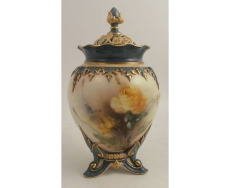 A Hadleys Worcester covered vase, decorated with yellow roses, raised on three feet, height 7ins - Finial restored, rest ok