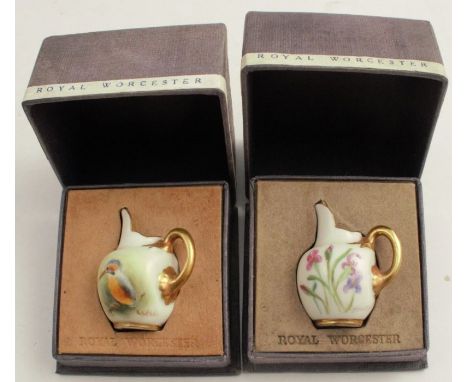 Two Royal Worcester miniature flat back jugs, one decorated with a kingfisher by Banks and the other with flowers by Murry, i