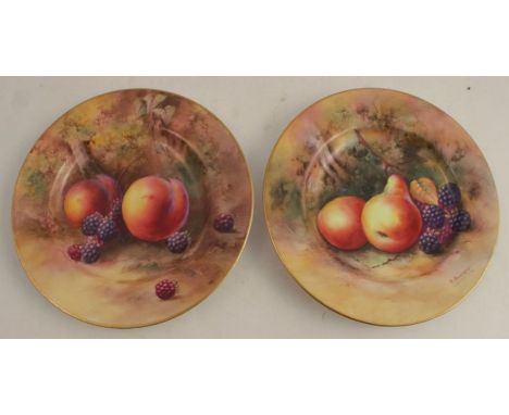 Two Royal Worcester plates, decorated with hand painted fruit by Price and Townsend, circa 1924 both signed, diameters 6ins -