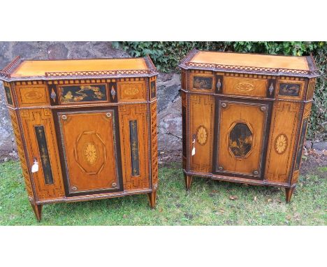 A pair of 18th century continental satinwood lacquer and inlaid breakfront cabinets, with fret pierced gallery and gilt brass