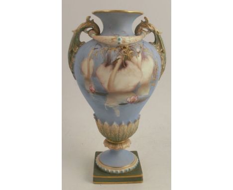 A Royal Worcester pedestal vase, the powder blue ground decorated with three swans swimming with lily pads and reeds by C Bal
