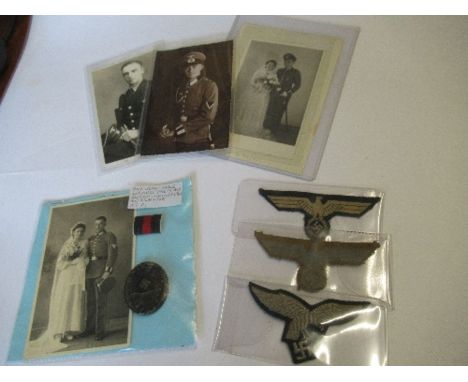 German World War 2, black wound badge and ribbon bar, with wedding photograph, together with three fabric RMBO motifs, and a 