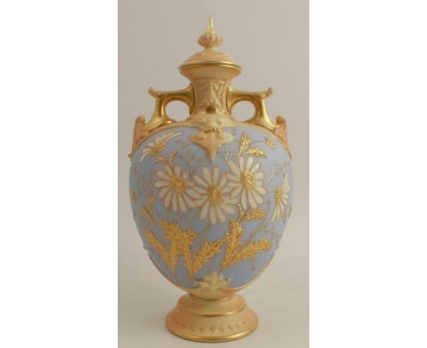 A Royal Worcester covered blush ivory vase, the powder blue ground body decorated with white and gilt daisy's, shape number 1