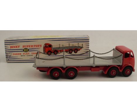 A Dinky Foden flat truck with chains, red cab, number 905, with box