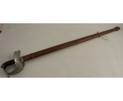A George V 1897 pattern Infantry Officer Sword, with wooden grip, the blade with etched decoration and marked J R Gaunt &amp;
