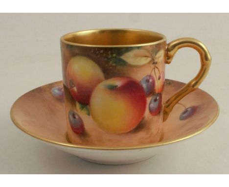 A Royal Worcester coffee can and saucer, painted with fruit to a mossy background by Roberts - Good condition