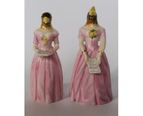 Two Royal Worcester candle snuffers, modelled as Confidence and Diffidence, pink colourway - Good condition